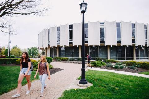 students by library